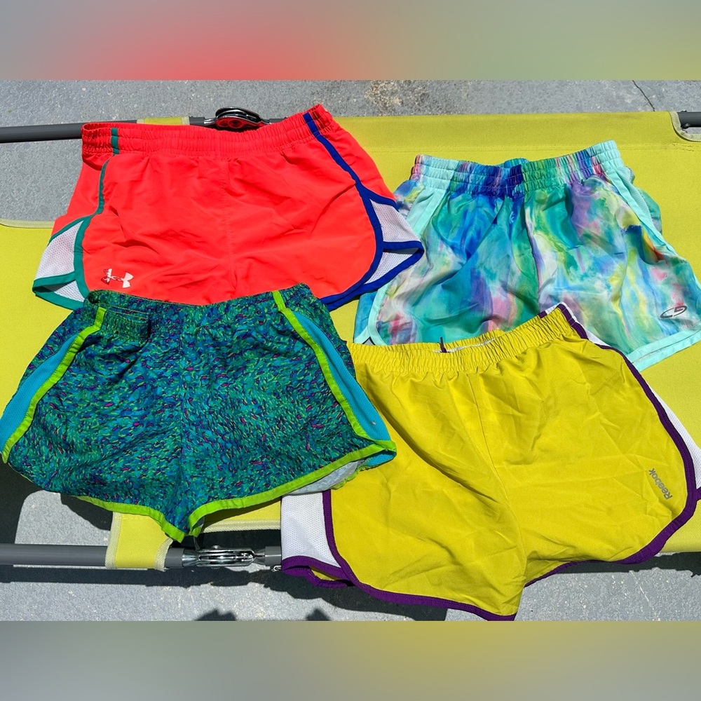 Girls L Running shorts: 4 pair, 1 UA, 1 Reebok and 2 LG by Champion